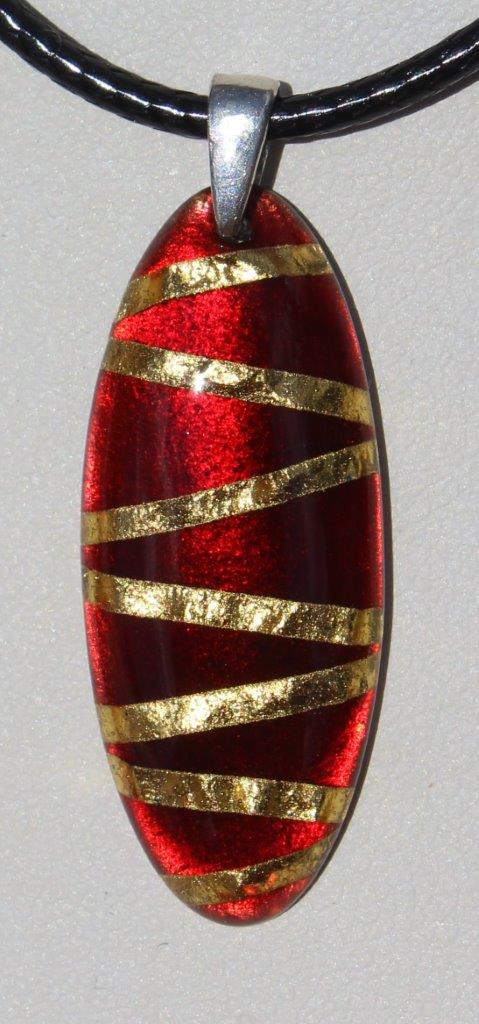 Pendentif « Rubis ovale enlacé d'or »